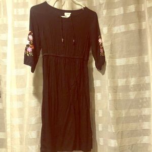 Patched black dress w/ chest slit